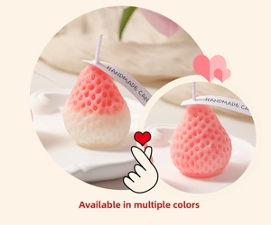 Macro detail of strawberry-shaped scented soy wax candles with handmade tags