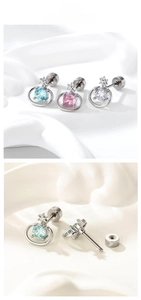 Detail view of Saturn earring with heart-and-arrow zircon and screw-back closure