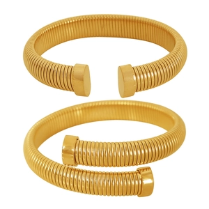 Golden titanium steel snake bone bracelet set with adjustable open spiral designs