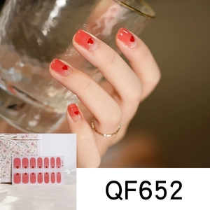 Detail showing red gradient heart nail stickers with QF652 model packaging display