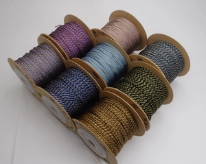 Detailed set of 9 colorful 1mm metallic cotton cords on spools for DIY jewelry making