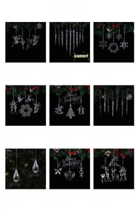 Macro shot of assorted clear acrylic Christmas ornaments including snowflakes and icicles