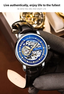 Macro view of Chenxi 8843 skeleton mechanical watch dial with silver case and blue ring