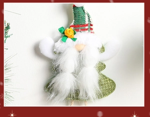 Detail of knitted Christmas gnome with forest green hat and red plaid fabric texture