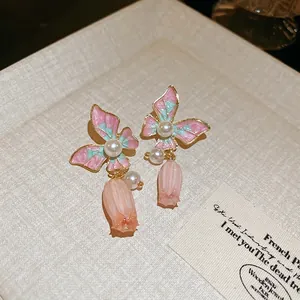 Élégantes boucles d'oreilles papillon et tulipe en perles avec émail et doré