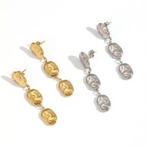 Three-tier irregular hammered metal drop earrings in gold and silver finishes