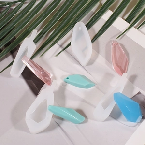 DIY stone pendant resin silicone molds with teardrop shapes and finished crystal jewelry