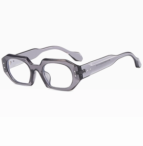 Detail view of transparent grey polygonal eyewear frame with thick temples and clear lenses