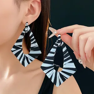 Zebra pattern geometric diamond earrings with silver needles for a modern fashion look