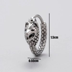 Detailed view of silver dragon head earring with dimensions of 1.5cm by 0.55cm