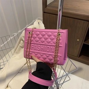 Pink embossed large capacity chain shoulder bag with quilted pattern and gold hardware