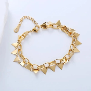 Gold geometric triangle pendant chain bracelet with adjustable extender on white background