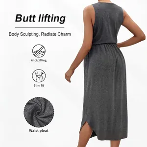 Slim fit dark grey sleeveless maternity maxi dress with waist pleats and irregular hem