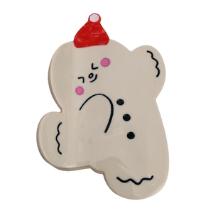 Cute gingerbread man bear hair claw clip in cream white with a red holiday hat