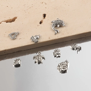 Polished silver ocean charms set with dolphin, turtle and heart pendants for jewelry DIY