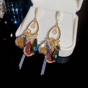Vintage water drop earrings with colorful gemstones and elegant gold tassels