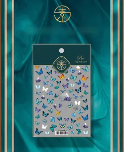 Macro detail of 3D butterfly nail art stickers model TS-122 on elegant silk texture