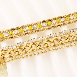 Luxury gold layered bracelet set with Cuban chain and cubic zirconia accents