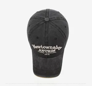 Top view of vintage washed charcoal baseball cap with Newtownabbey embroidery detail