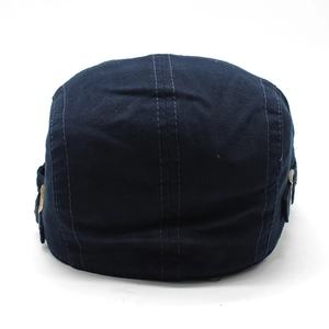 Rear view of navy blue mesh beret with reinforced stitching and adjustable side buckle