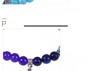 Macro detail of natural 8mm multi-color stones and metal spacer beads for yoga bracelet