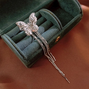 Luxury zircon butterfly tassel clip earrings in silver finish on green velvet box