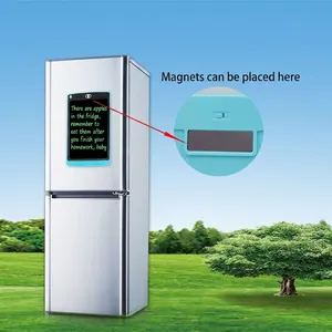 Blue LCD writing tablet with magnetic back attached to a refrigerator as a family memo board