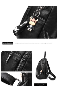 Detail of black pebbled leather backpack with silver zippers and a cute DIY calf charm