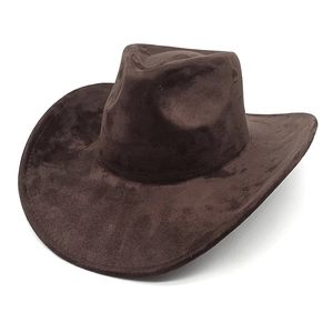 Detailed view of dark brown suede cowboy hat featuring wide brim and top concave design