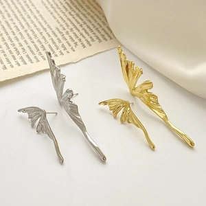 Asymmetric liquid butterfly wing stud earrings in gold and silver finish set