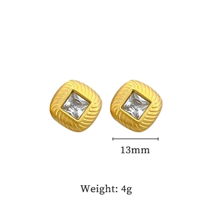 Detailed view of 13mm golden titanium steel square earrings with sparkling cubic zirconia