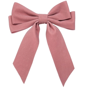 Elegant long ribbon velvet bow hair clip in dusty rose pink on white background