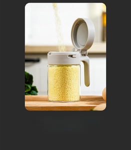 Detail view of seasoning jar with easy-slide lid for refilling spices and grains