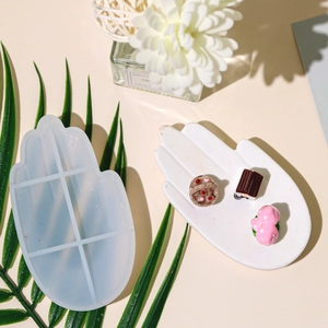 Hamsa palm shape silicone mold for DIY resin coasters and storage trays with grid pattern