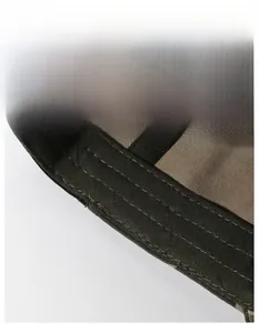 Detail of outdoor sun hat featuring a wide moisture-wicking sweatband and durable green fabric
