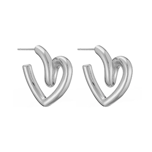Detail view of irregular hollow pea heart stud earrings with silver metallic finish