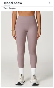 Detailed view of high-waist taro purple yoga leggings worn by a model in studio