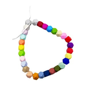 Perline da dentizione geometriche in silicone da 17mm su cordoncino bianco per fai da te