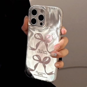 Detail showing pink ribbon patterns and calligraphy on transparent iPhone Pro case