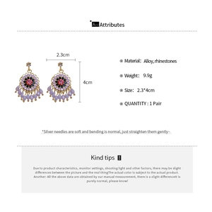 Detailed view of vintage crystal flower tassel earrings with size and weight dimensions