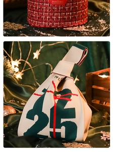 Detail of a white knitted gift bag with '25' pattern and a red tweed makeup bag