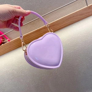 Cute purple heart-shaped jelly handbag for girls with glossy finish and metal buckles