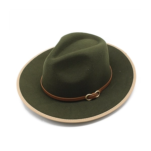 Dark green wide brim fedora hat with brown leather band and tan fabric binding trim