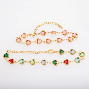 Gold-plated titanium steel bracelet set featuring heart-shaped pink and multicolor stones