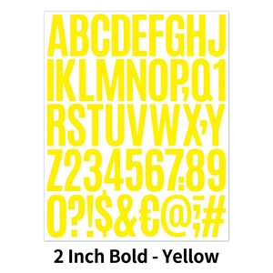 Detail of 2-inch yellow bold alphabet and number stickers for scrapbooking and DIY