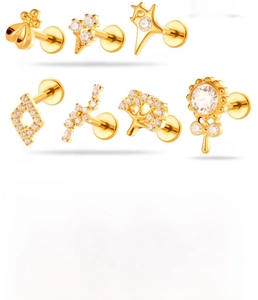 Detailed view of titanium alloy studs with zircon in bee, star, and flower shapes