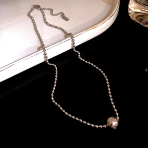 Minimalist silver stainless steel beaded necklace with a polished sphere pendant