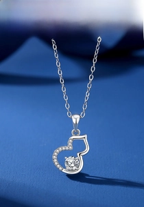 Detailed macro view of S925 silver calabash pendant with sparkling moissanite stone