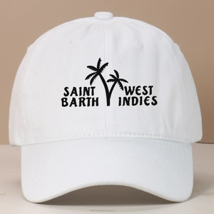 Close-up of Saint Barth palm tree embroidery on a white vintage washed baseball cap
