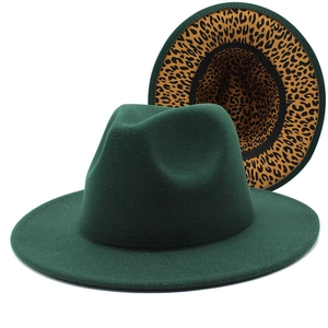 Detail of dark green fedora hat showing the unique leopard print underbrim design